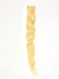 #613 Blonde Indian Hair bundle with white background. The bundle has a non processed natural pattern. It's made with 100% raw virgin Indian hair.